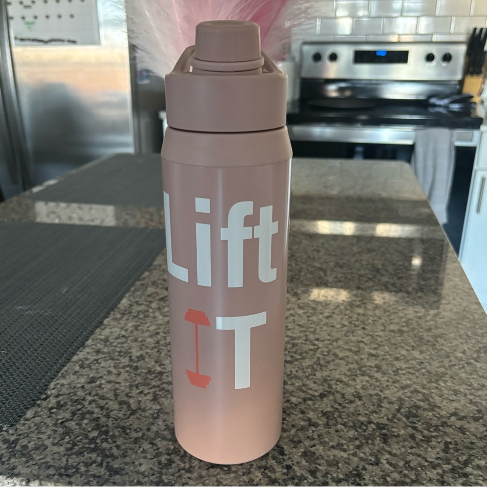 Pink weight lifting water bottle